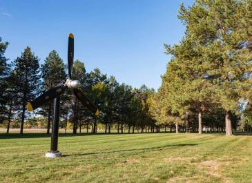 A propeller on green space within the grounds of the North Dakota Veterans Home.