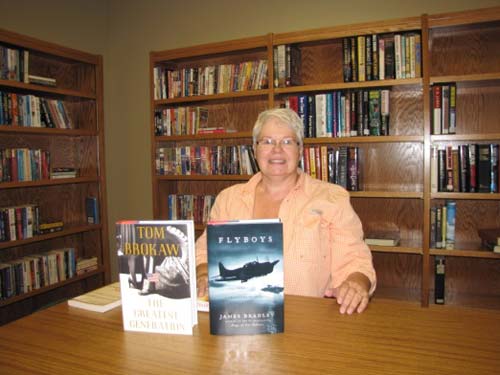 Thiry Narum at Grand Opening in August of 2011. She helped organize the library.